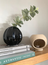 Load image into Gallery viewer, a round contemporary bud vase with a tilted opening
